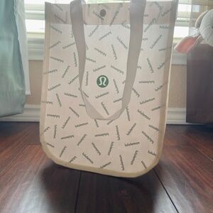 LULULEMON Shopping Bag White With Green Font One Button Snap